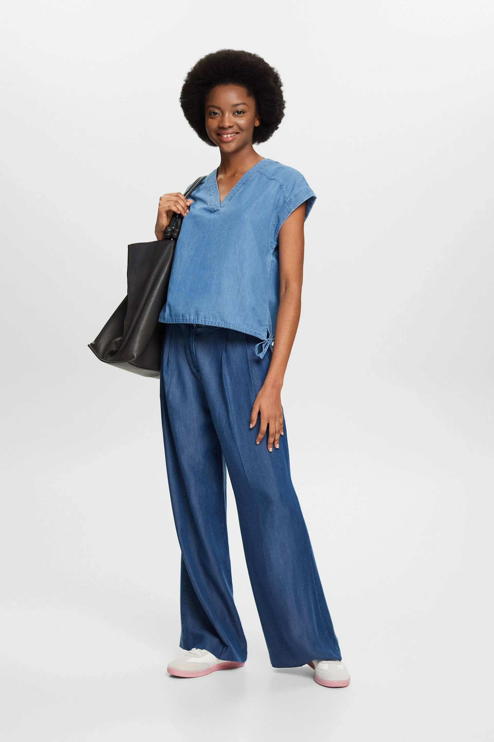 Blusa in denim senza maniche