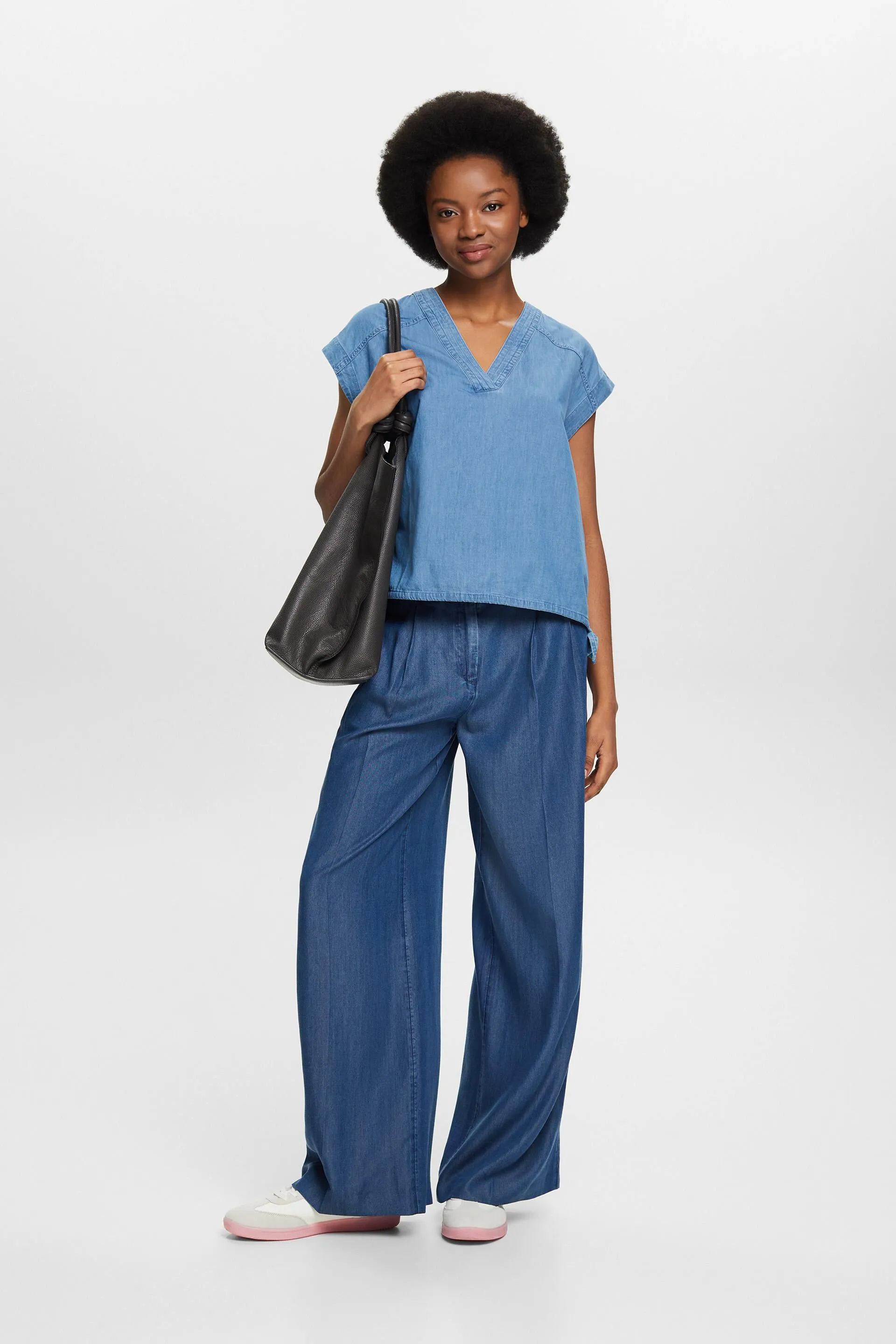 Blusa in denim senza maniche