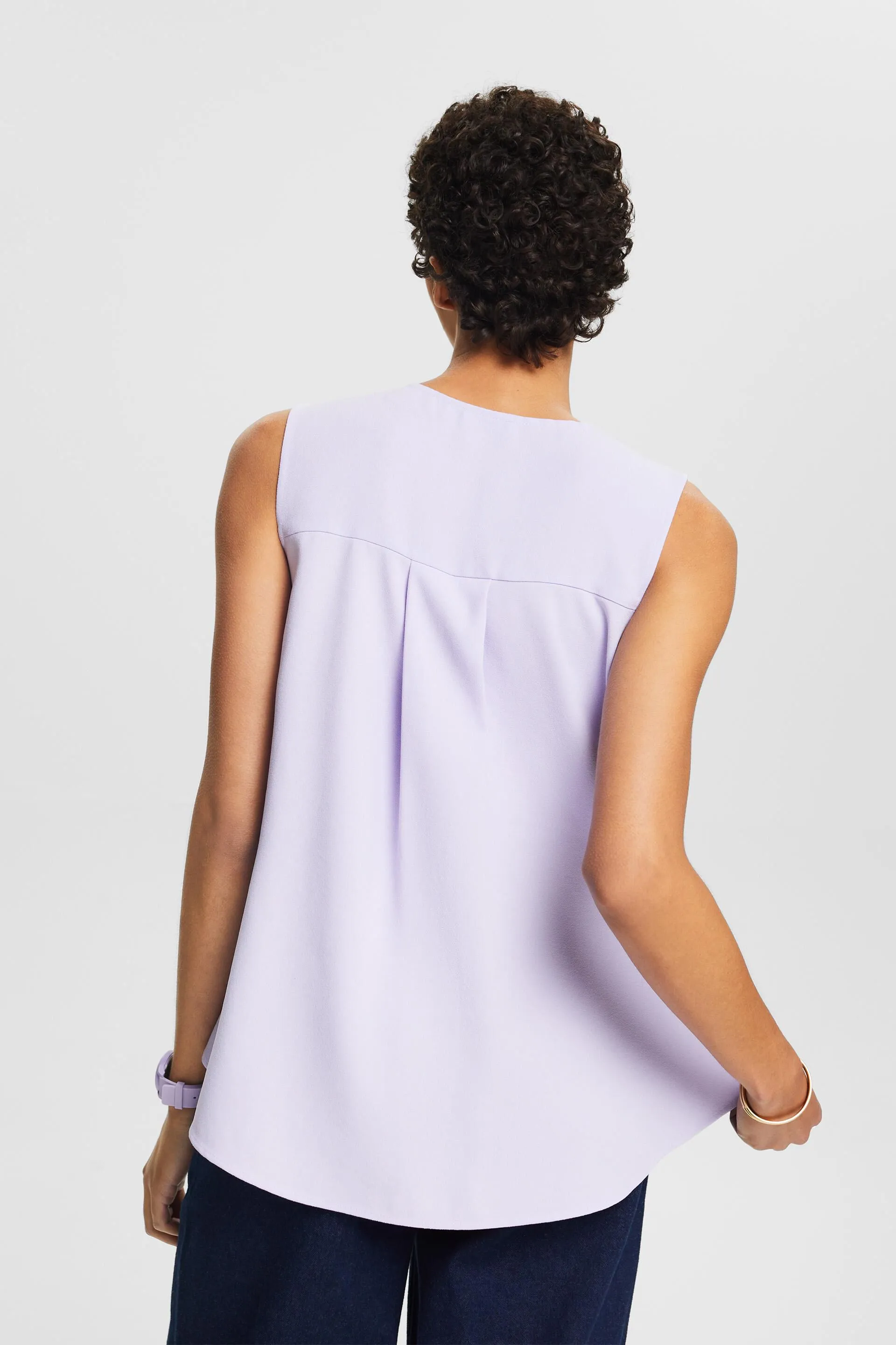 Blusa senza maniche e con scollo a V