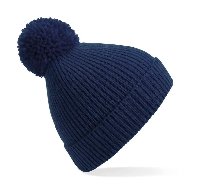 Cappello a coste con pompon