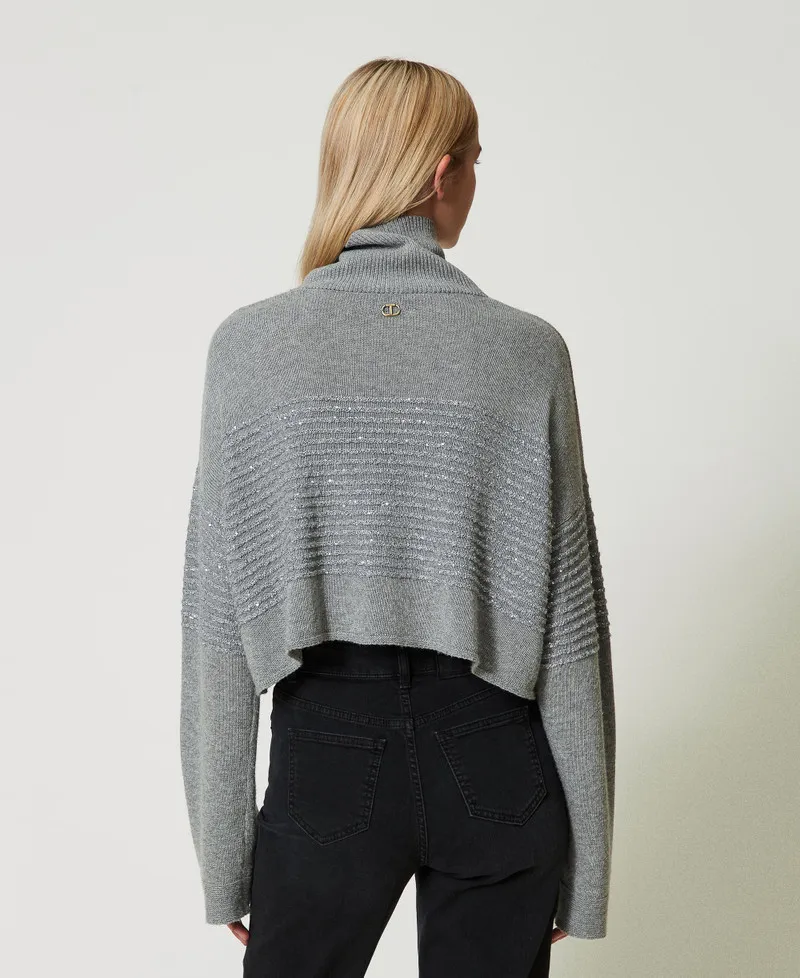 Maglia dolcevita in misto lana con paillettes