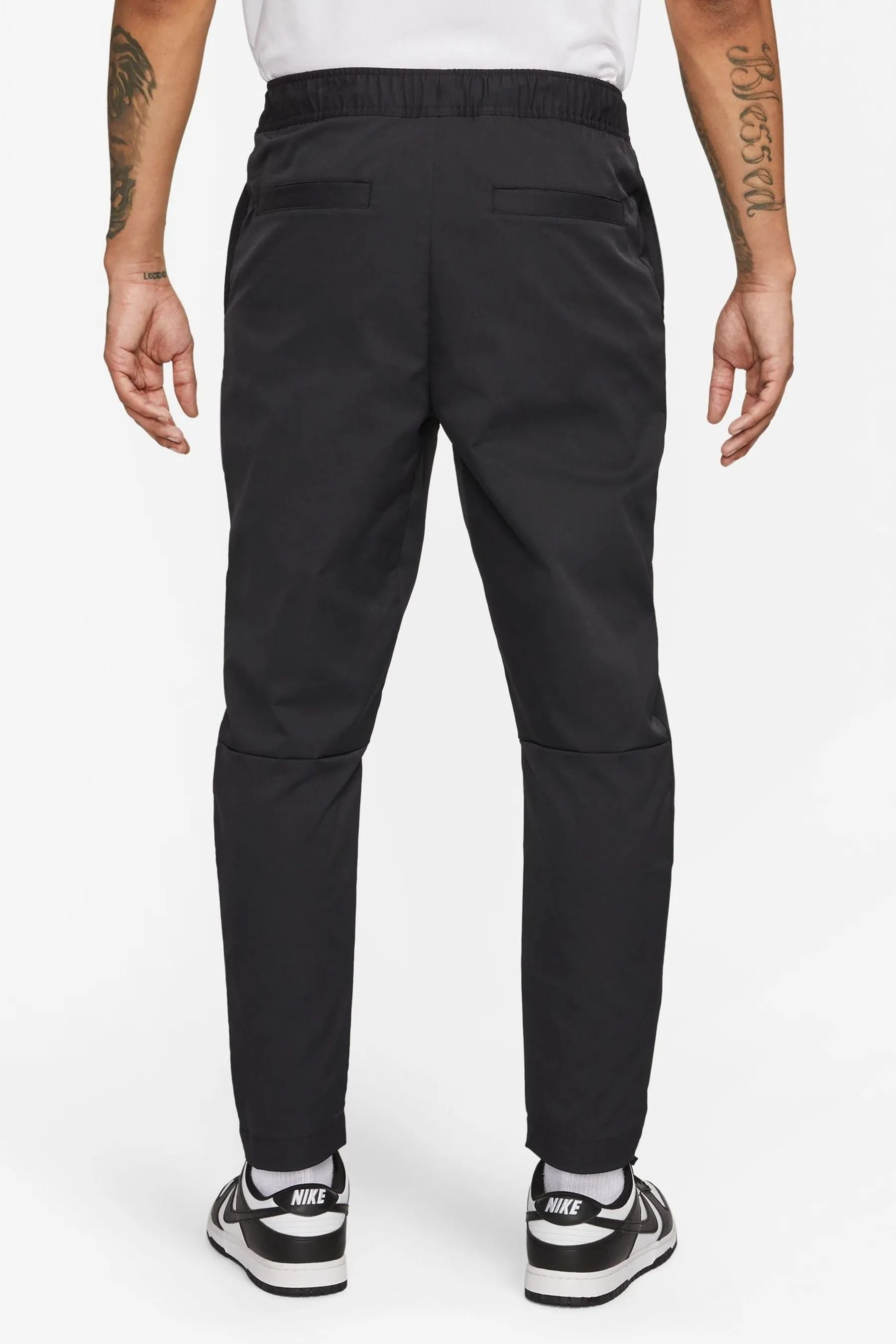 Nike Club - Pantaloni stretti in fondo