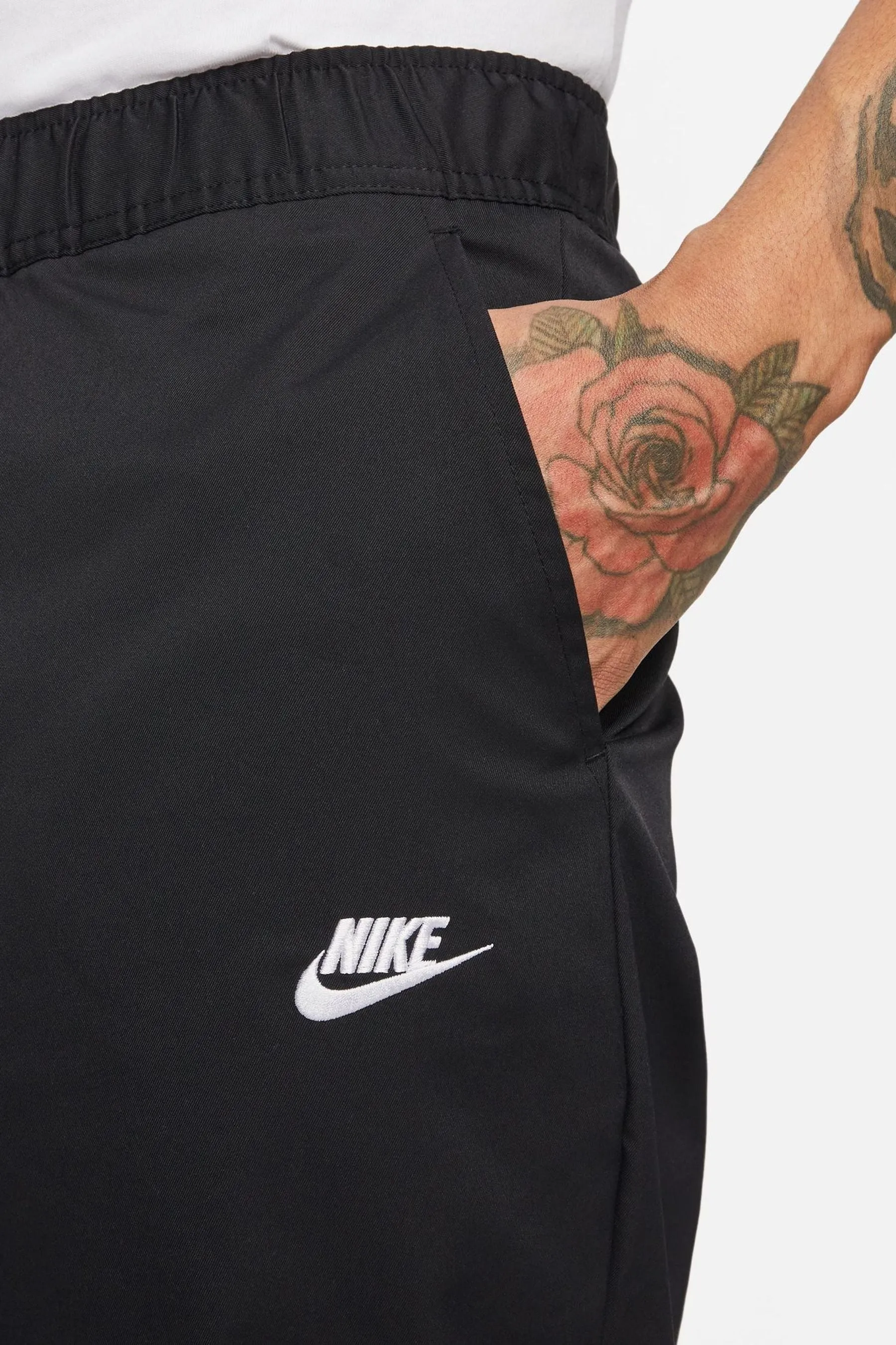 Nike Club - Pantaloni stretti in fondo