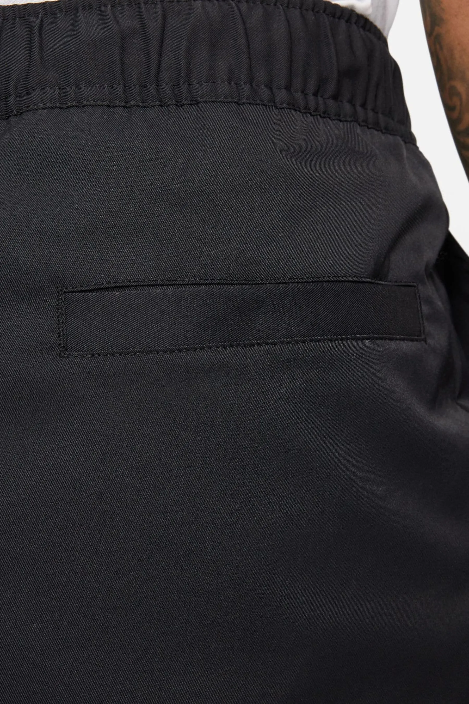 Nike Club - Pantaloni stretti in fondo