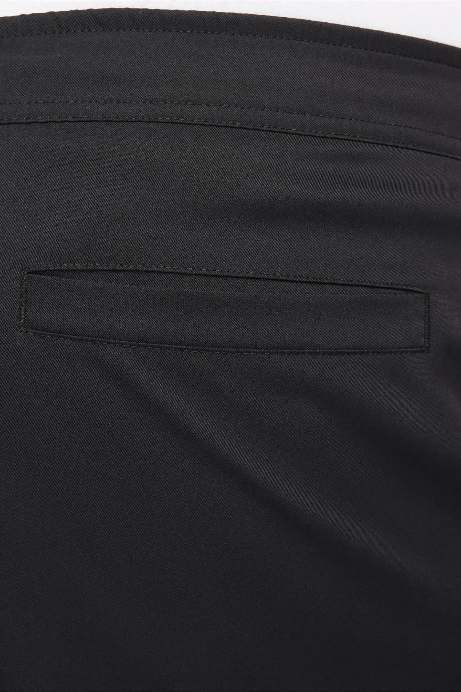 Nike Club - Pantaloni stretti in fondo
