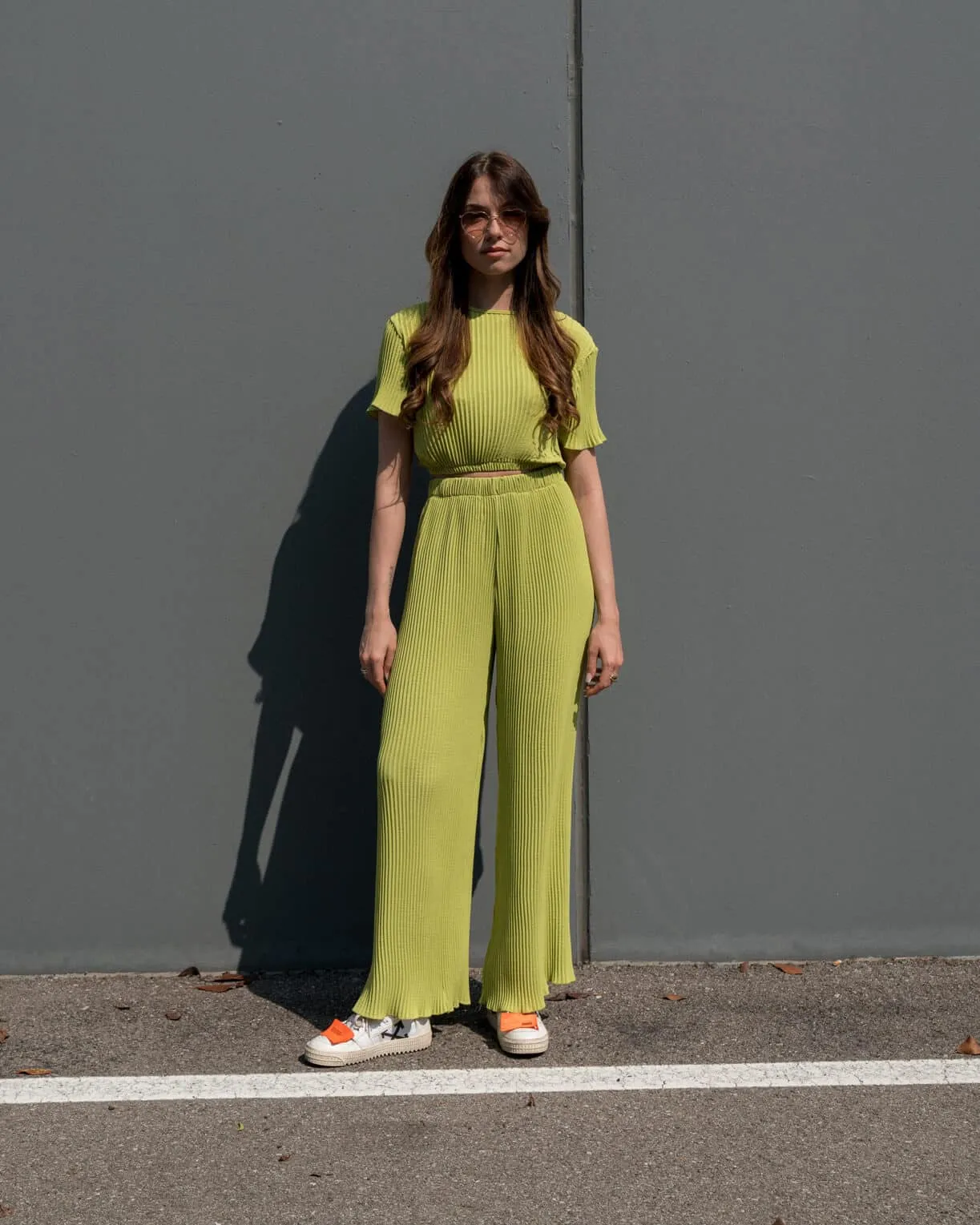 Pantalone a palazzo plissettato verde chiaro