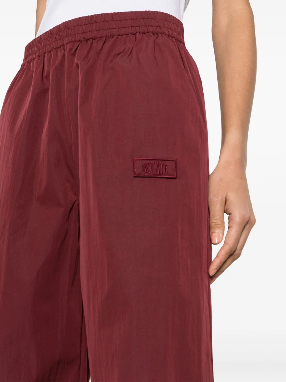 Pantaloni a palazzo con vita elasticizzata in marrone - donna