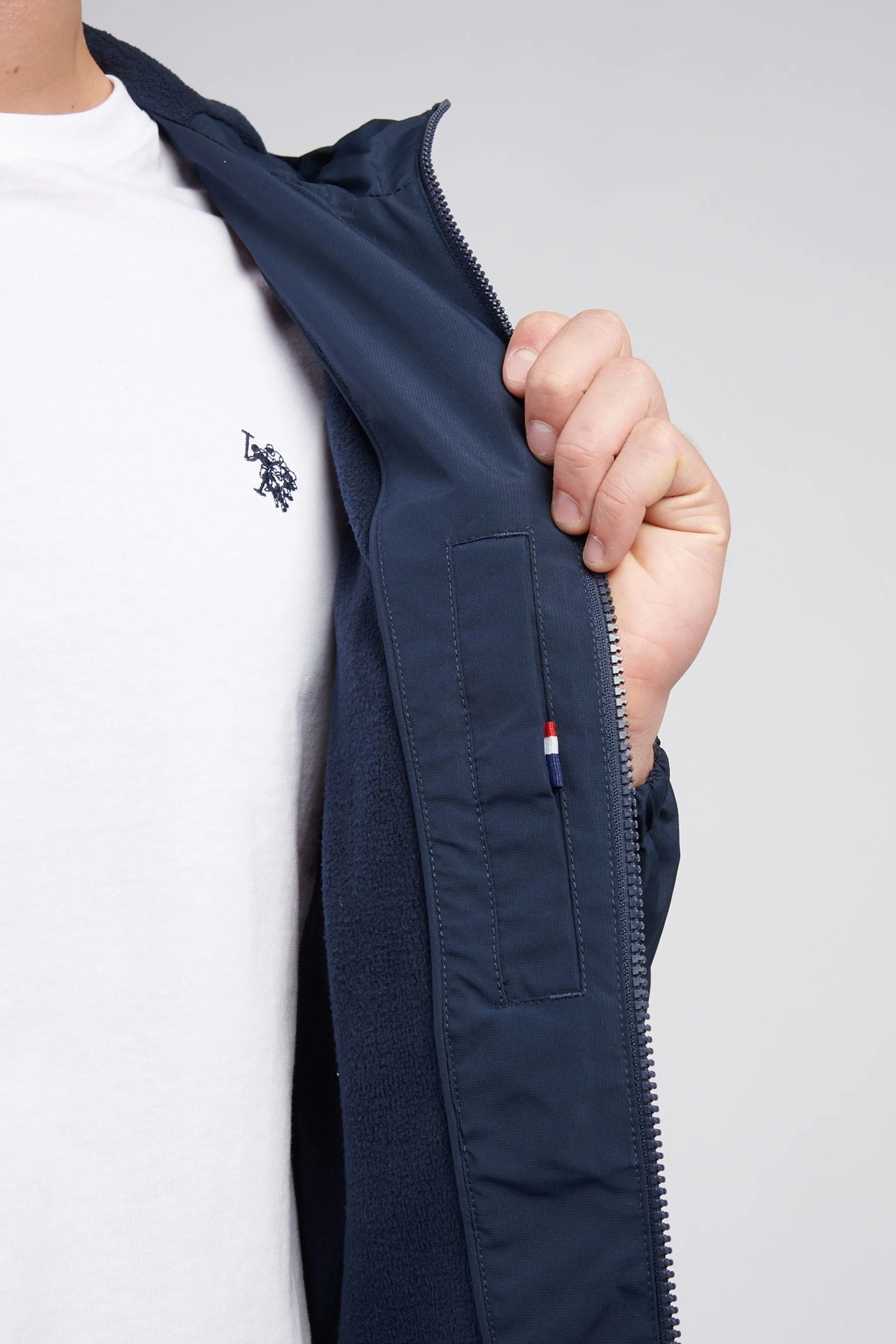 U.S. Polo Assn. Giacca a vento foderata in pile da uomo    